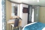 Aqua Theater Suite - 1 Bedroom Stateroom Picture